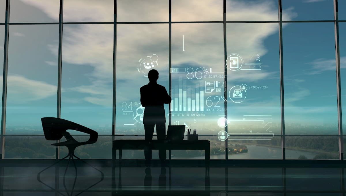 Silhouette of a person surrounded by floating digital data overlays, illustrating AI-driven fraud threats in banking
