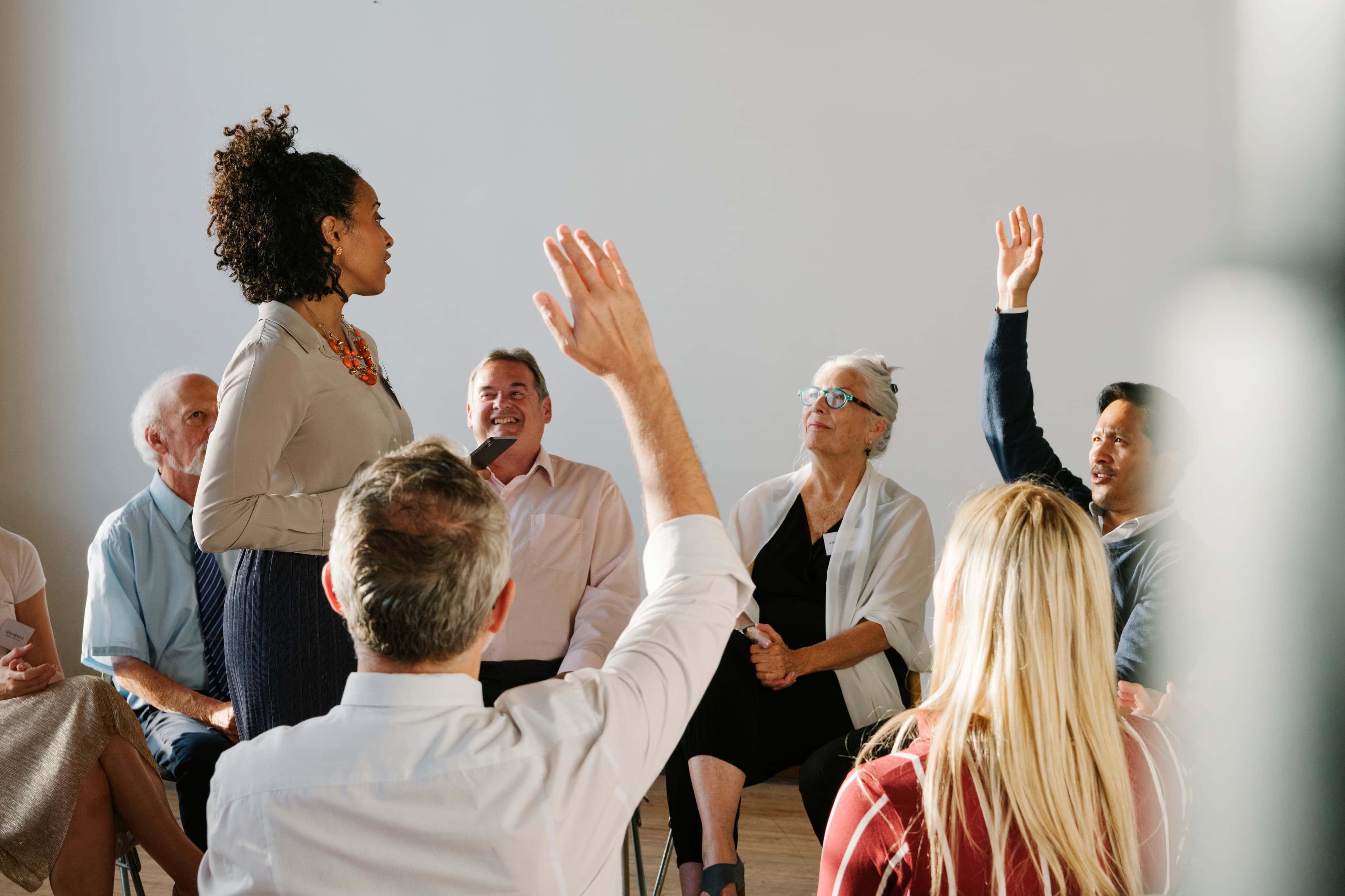 diverse_group_of_people_seated_AS_340499093