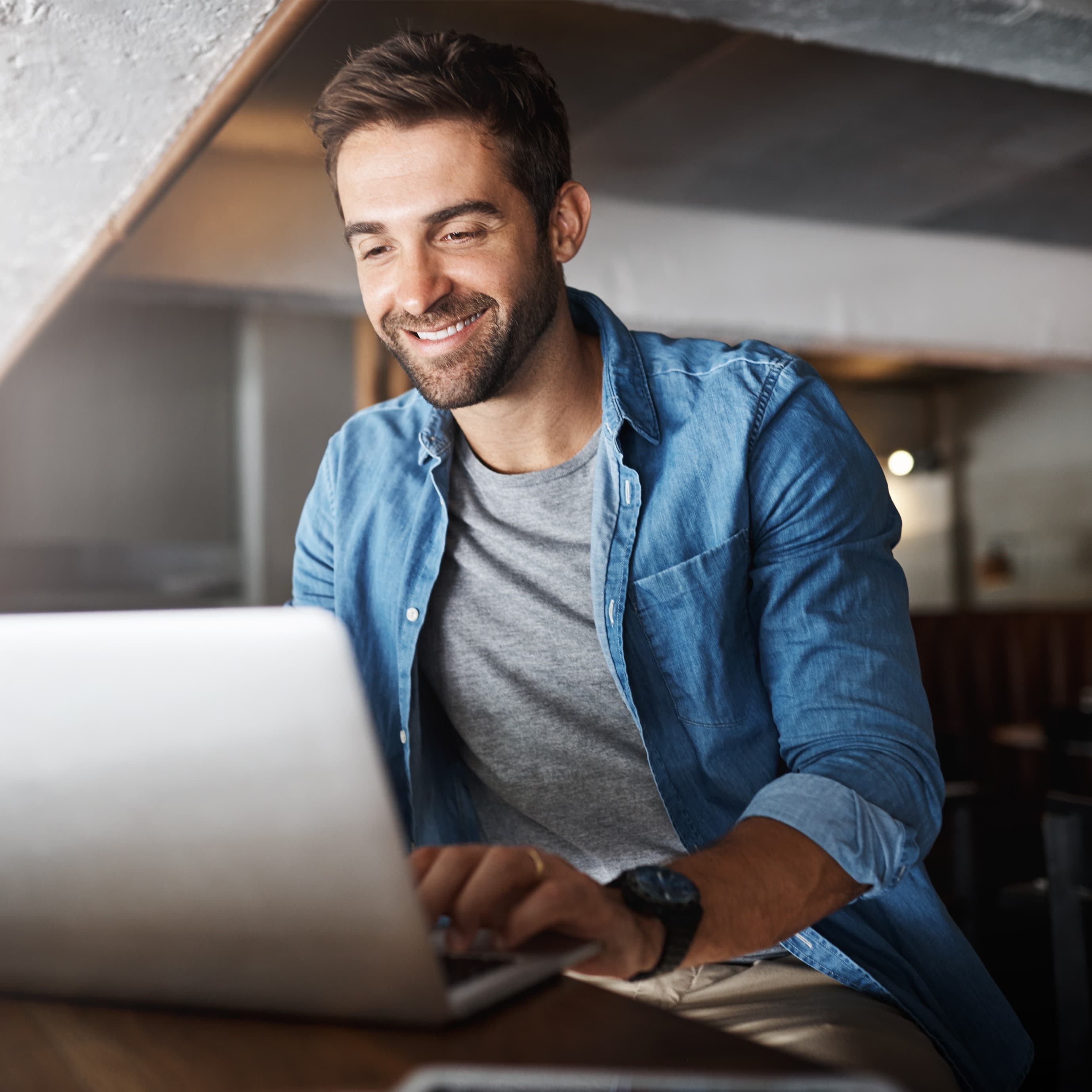 man working on laptop