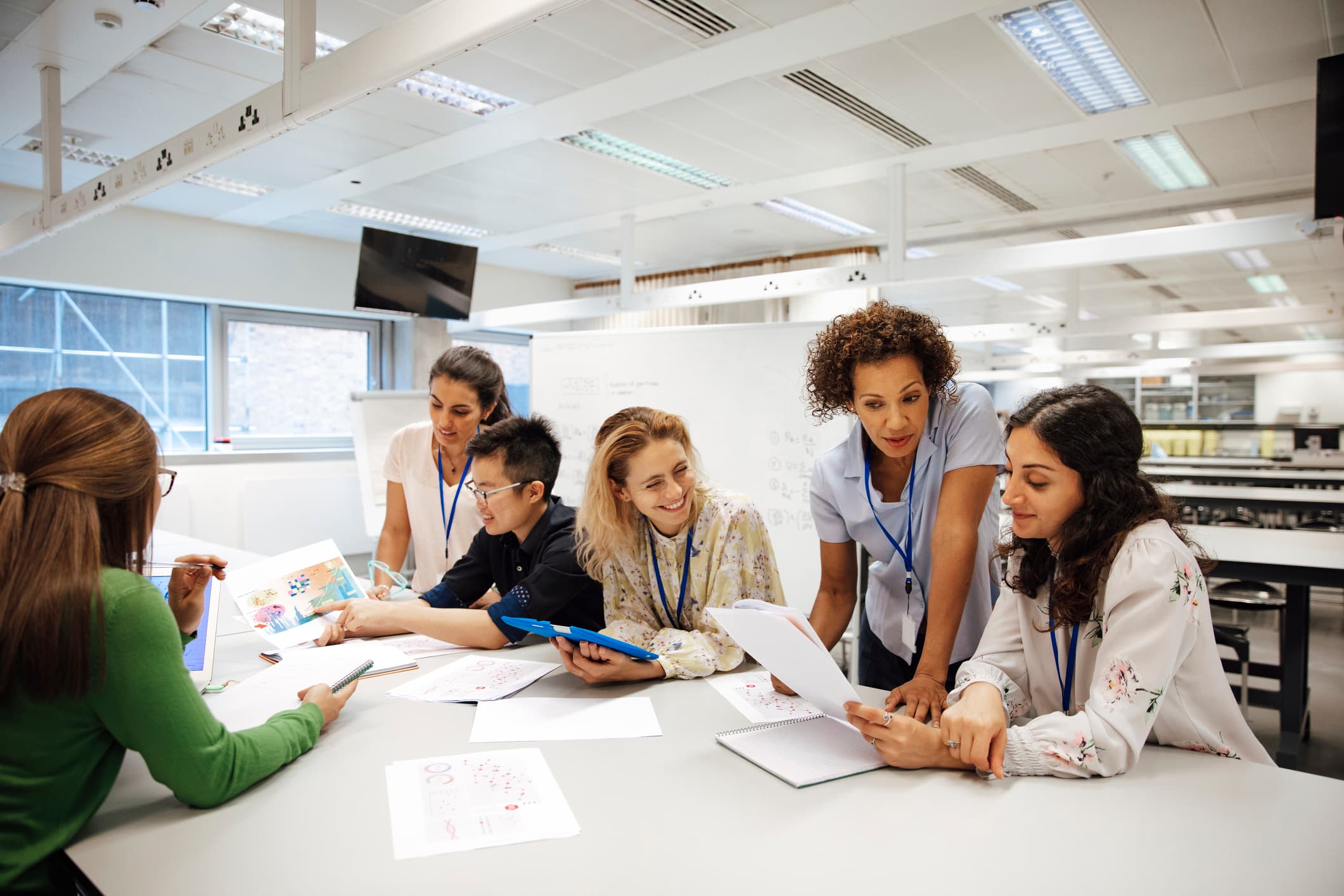 A group of professionals collaborating around a table