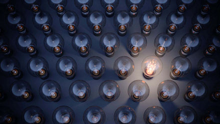 Glowing Light Bulb Standing Out From the Crowd iStock-1253473993 website.jpg 1