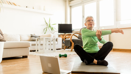 Health-senior woman-exercising-online trainer-1270225750.jpg