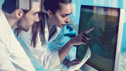 Health-scientists-Interacting-touch Screen-578075258.jpg