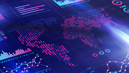 Abstract world map and financial graphs iStock-1388369589.jpg 1